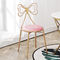 Chaises modernes de luxe de salle à manger avec le cuir Seat de cadre formé par papillon en métal